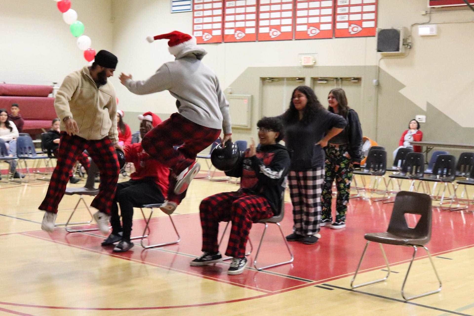 students playing the balloon pop game