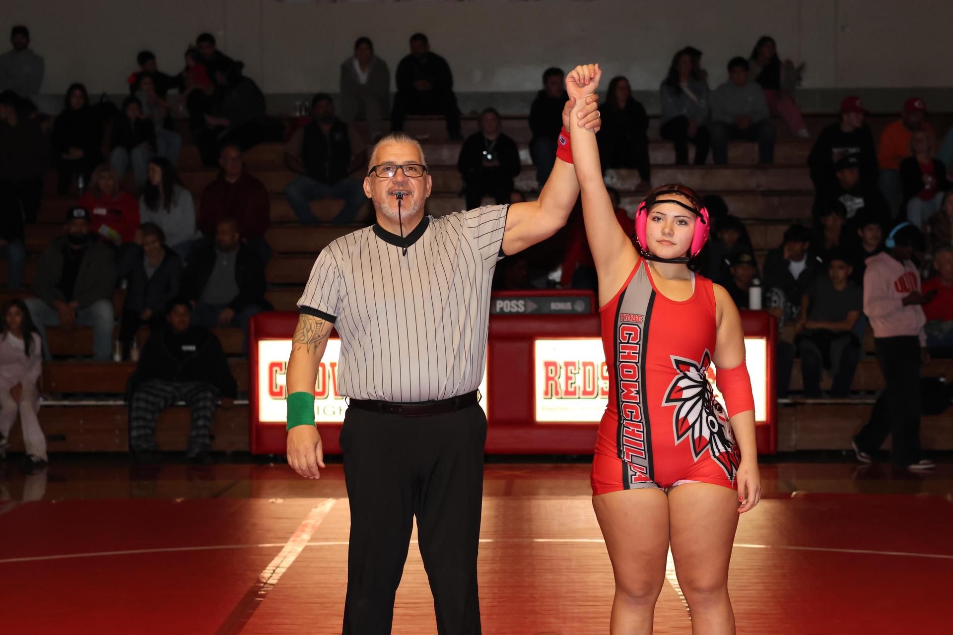 Wrestling winners with hands up 14