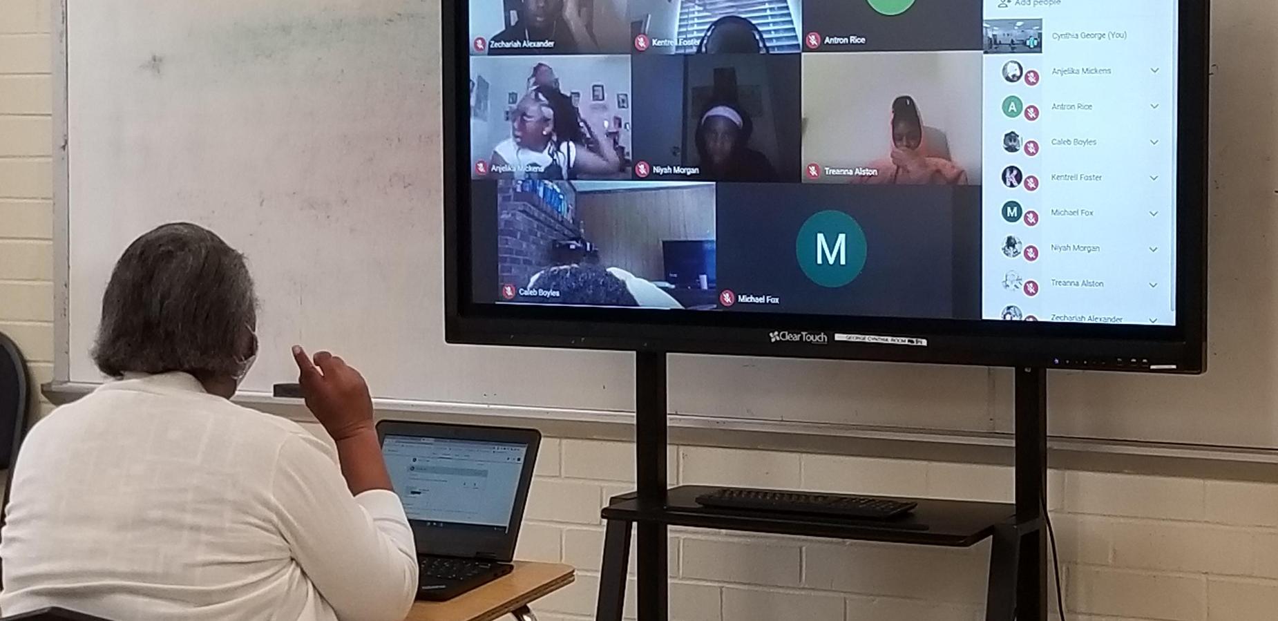 Ms. George teaching virtually