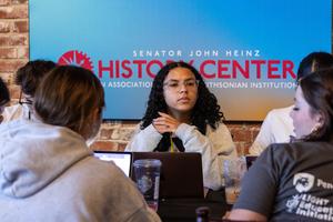 A student listens intently
