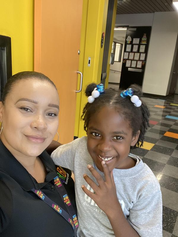 Ms. Nikia with student.