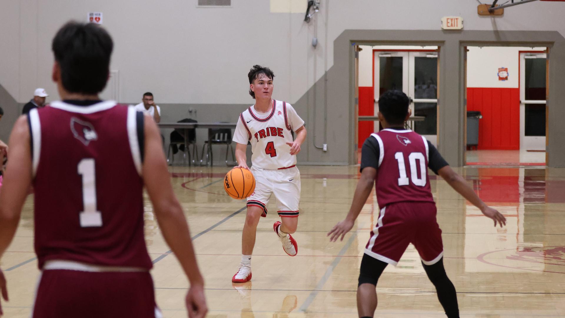 Varsity Boys Basketball playing vs. Orosi 61