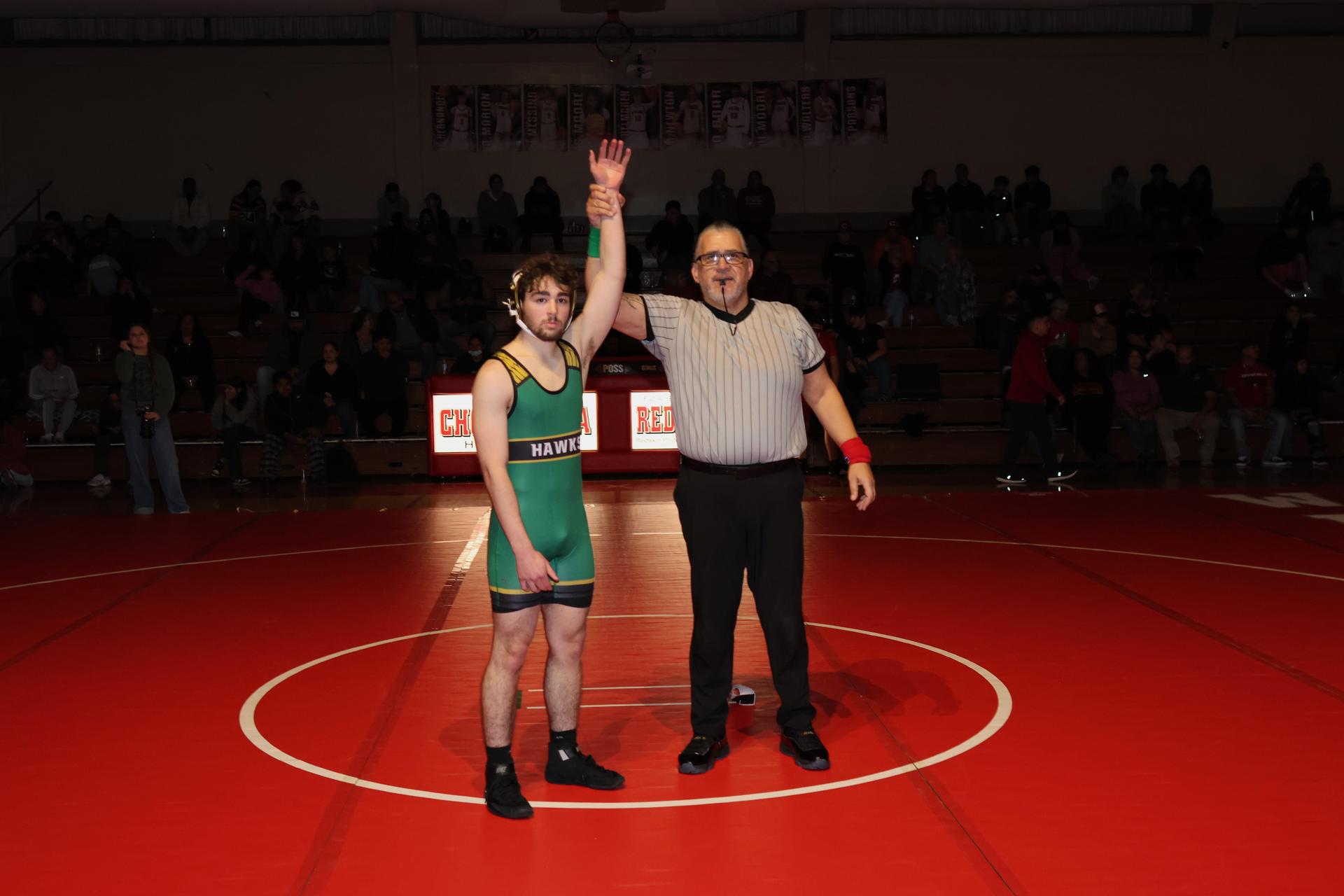 Wrestling winners with hands up 87