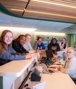 Students smiling with DVFriends Receptionist Sandy