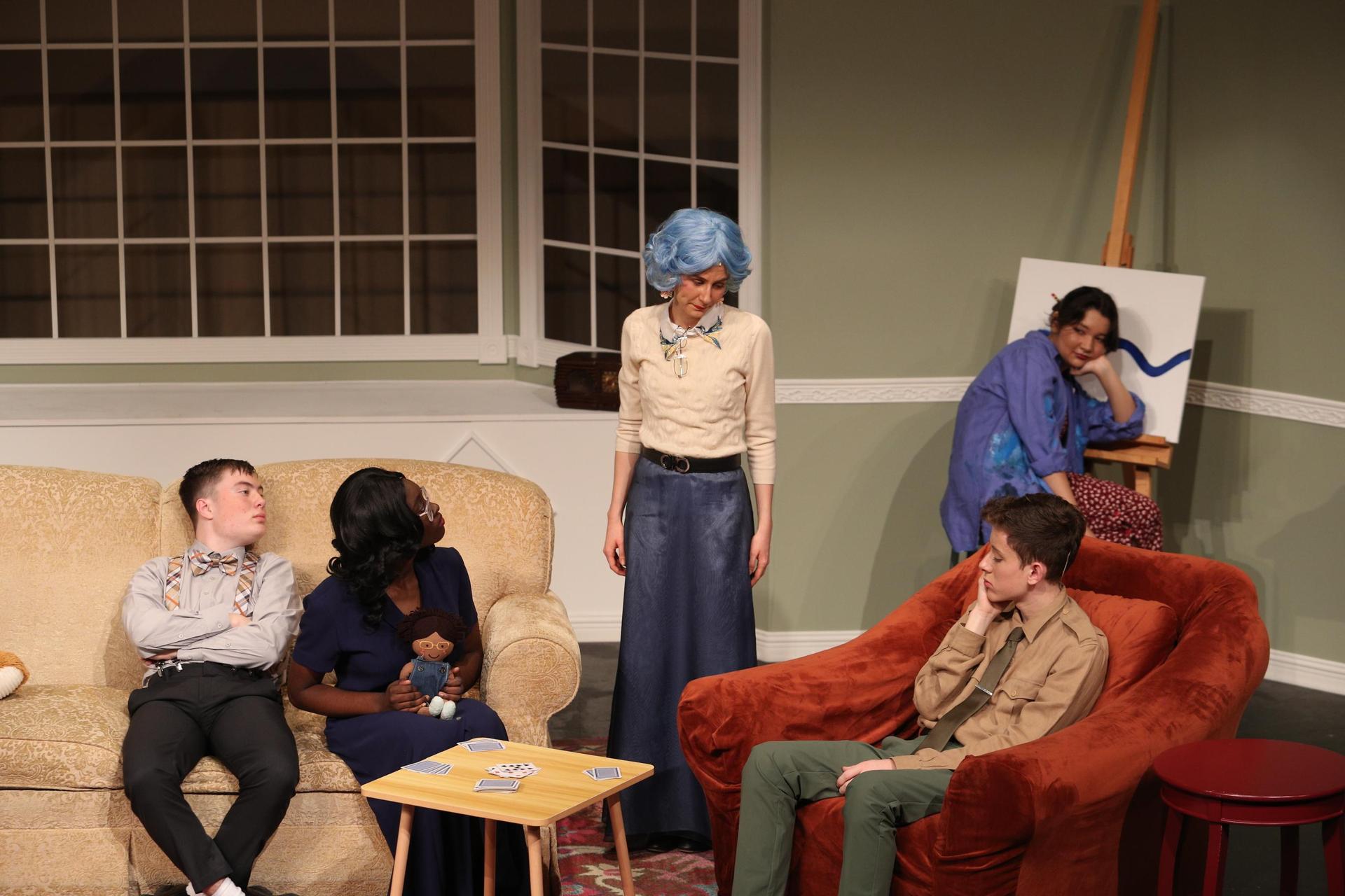 Characters sitting around a couch