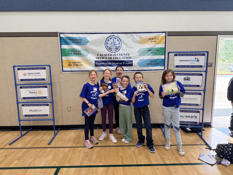 winning students with trophy