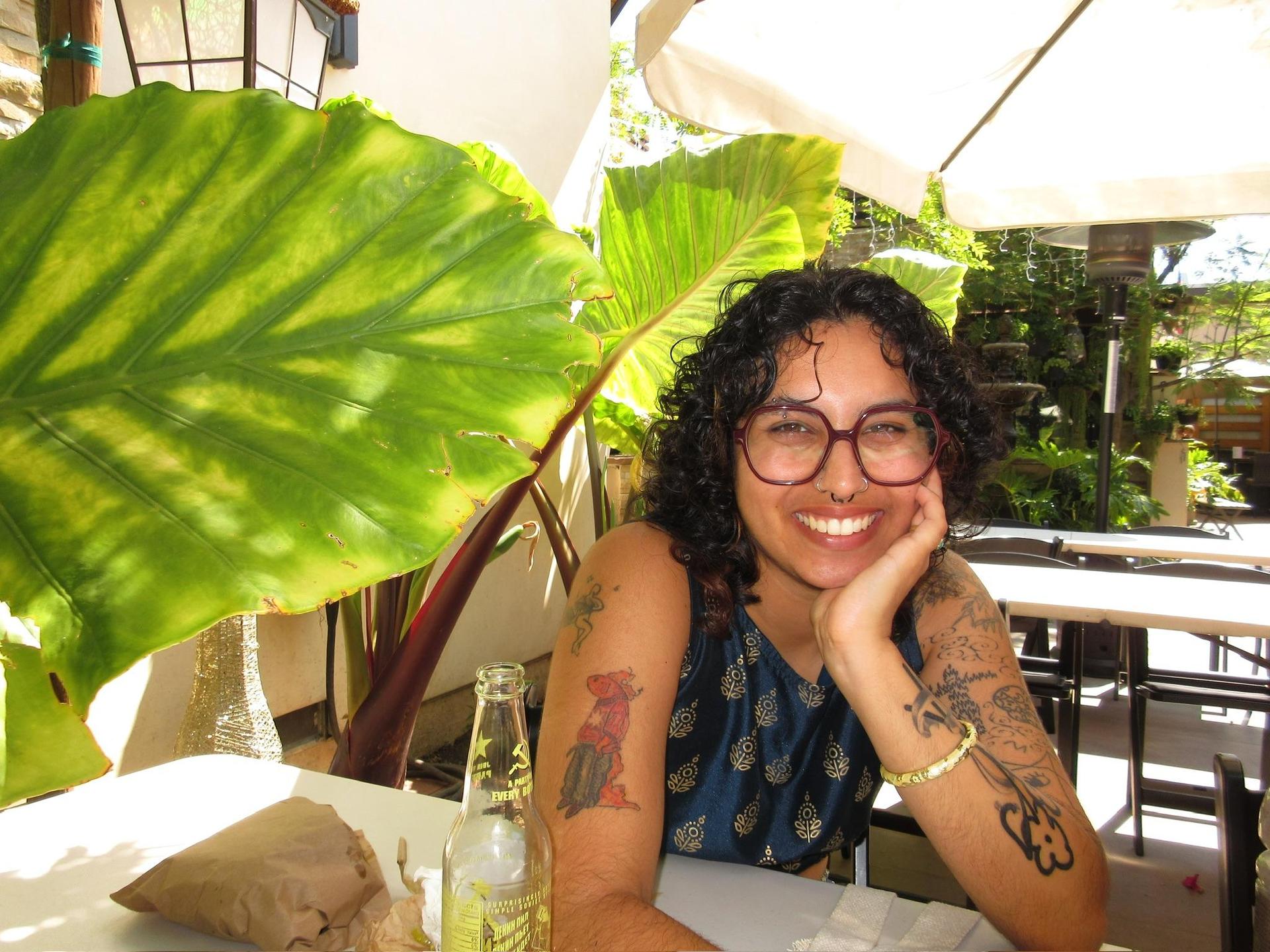 Teacher Emma with plants