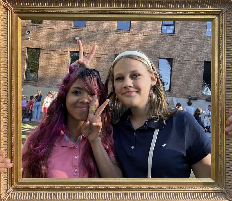 Two female students posing in frame at SLArts Fest
