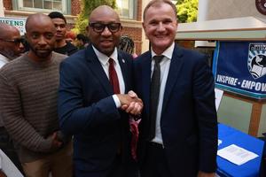 Mr. Wilk, a teacher at GCHS poses with Queens Borough President in a photo