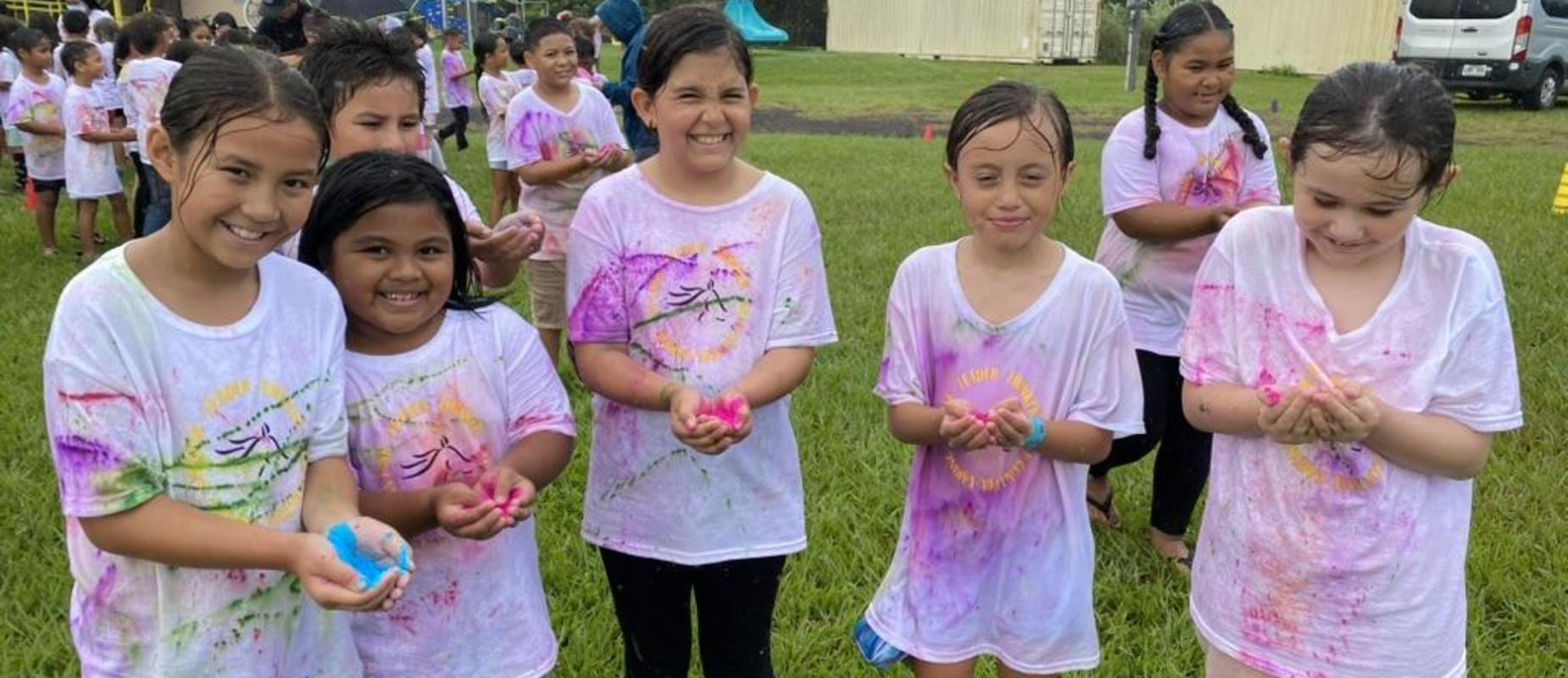 Students with colored powder at Rainbow Run