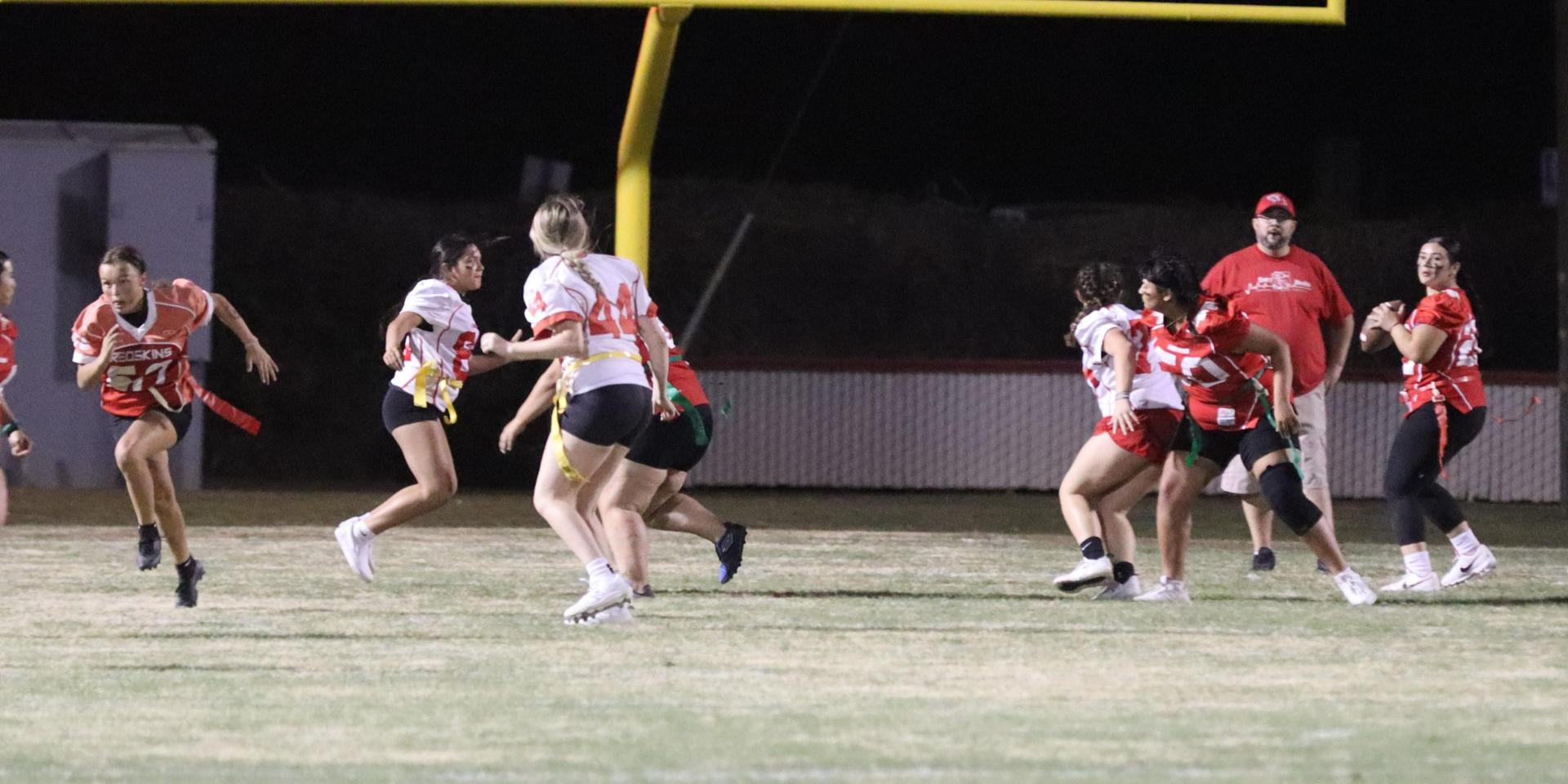 girls playing flag football