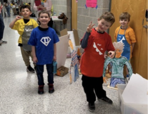 A team of students posing in a hallway at the Odyssey of the Mind competition.