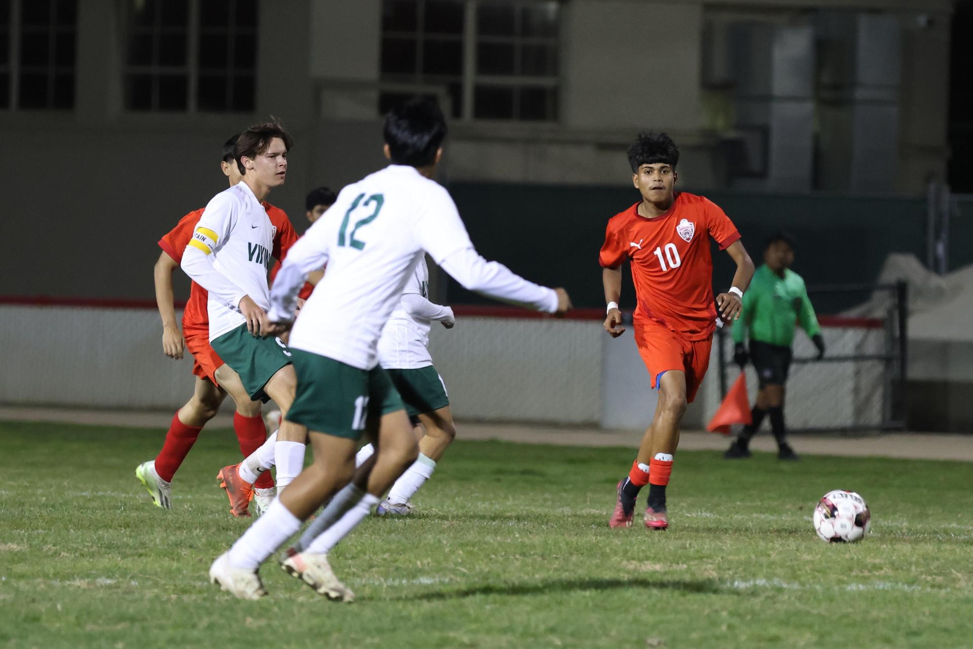 Varsity boys play soccer against Kingsburg