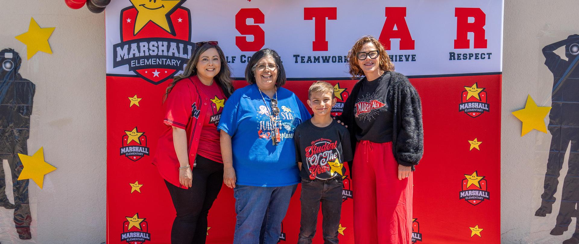 Student of the year with Principal, teacher and Superintendent Sanders