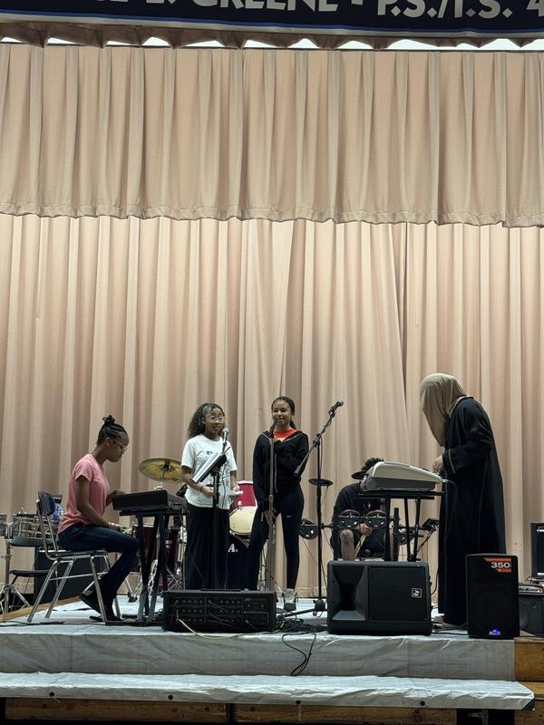 Students performing a duo together our eighth graders