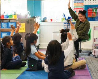 staff in class with students