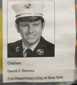 Students wore pictures of firefighters who died on Sept. 11.