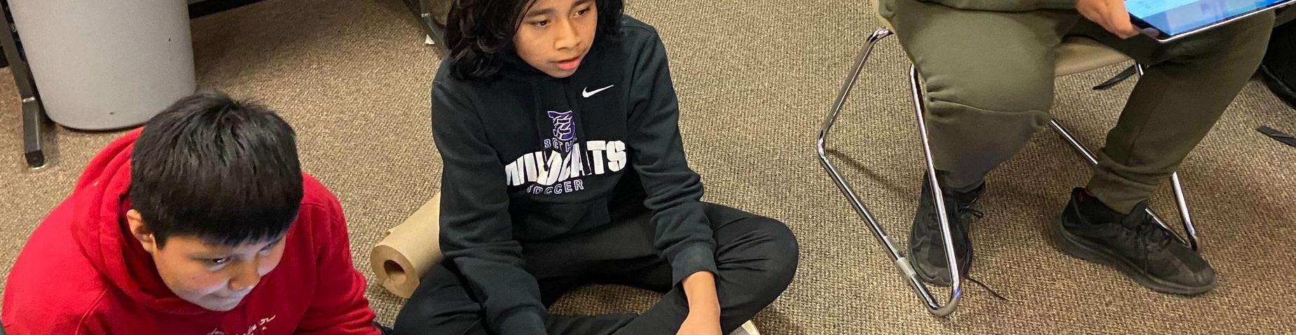 Students in technology class are using robots to learn.