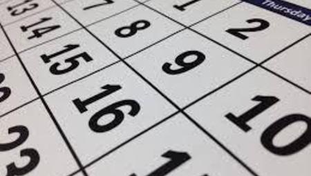 Close-up of a calendar showing dates and days of the week.