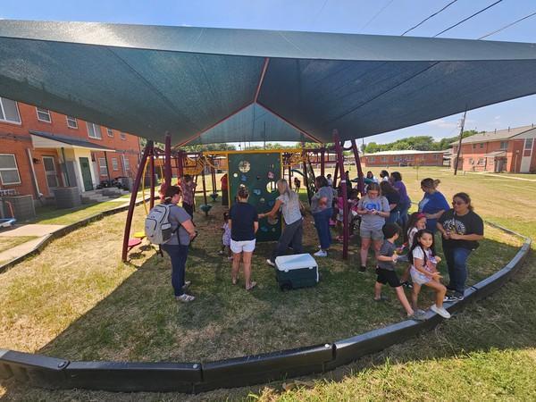 Teachers and students at the park.