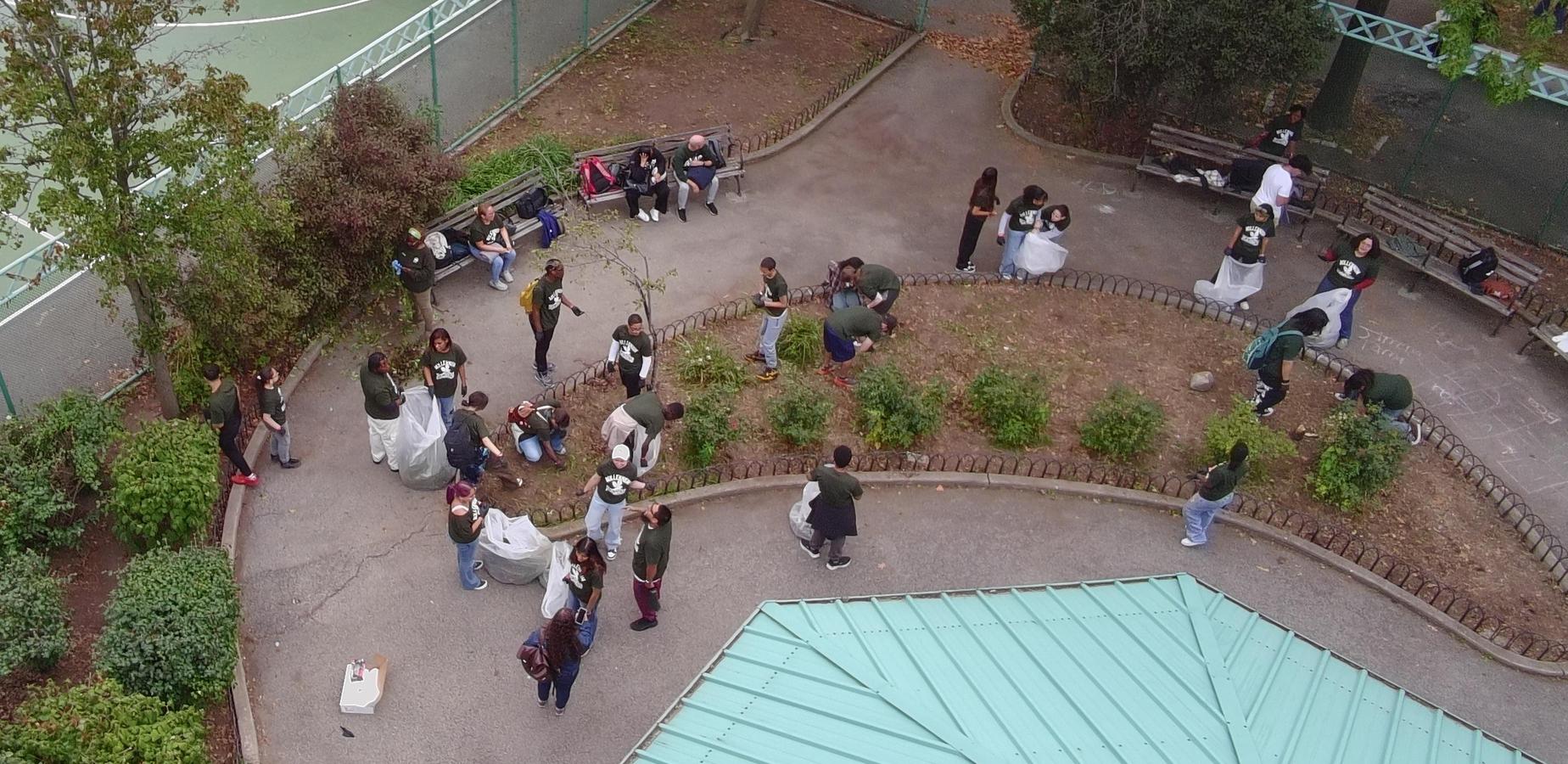 Students cleaning the park for community service.