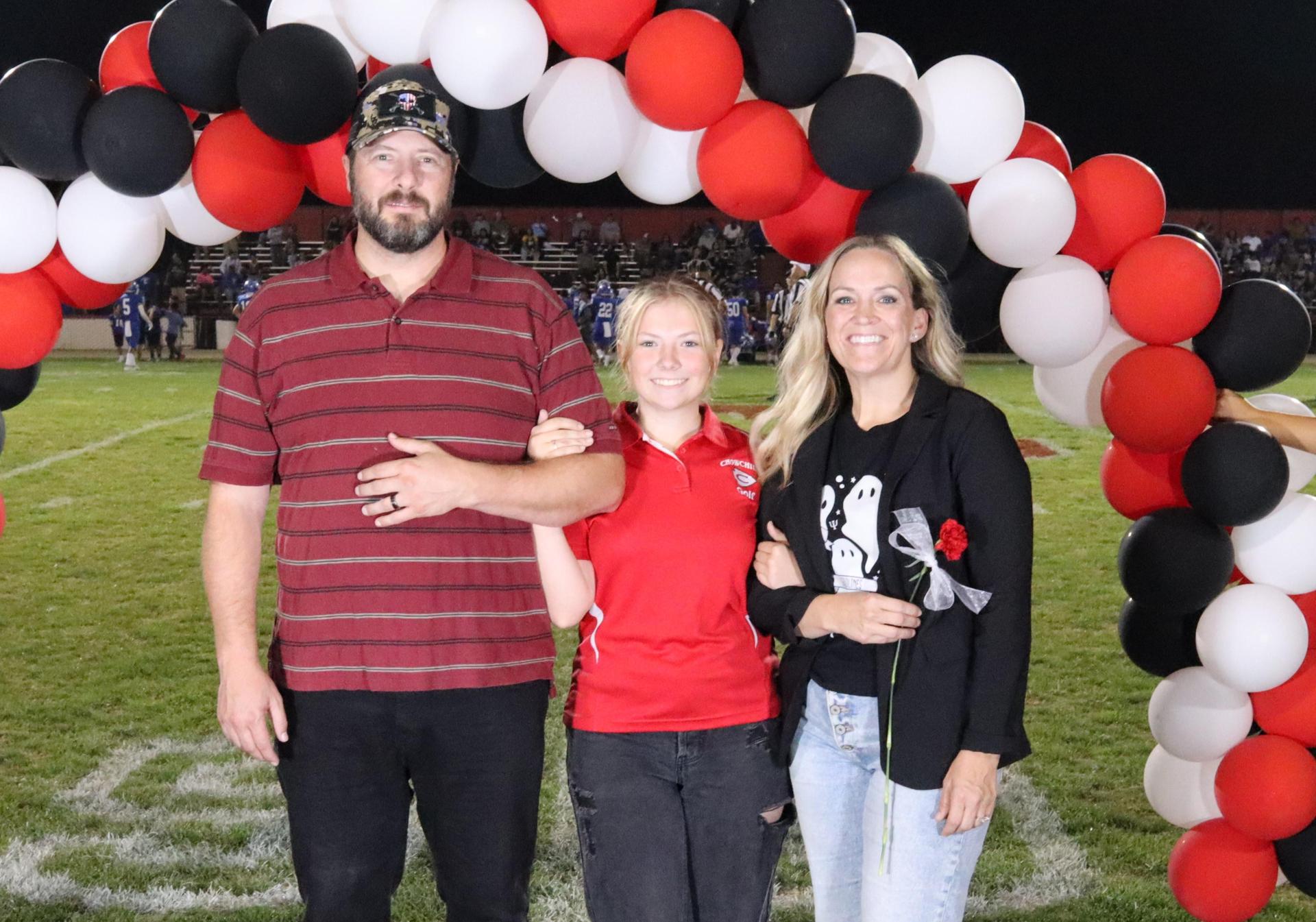 seniors and their escorts celebrating senior night