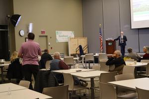 Richard Martin answers a question from an audience member