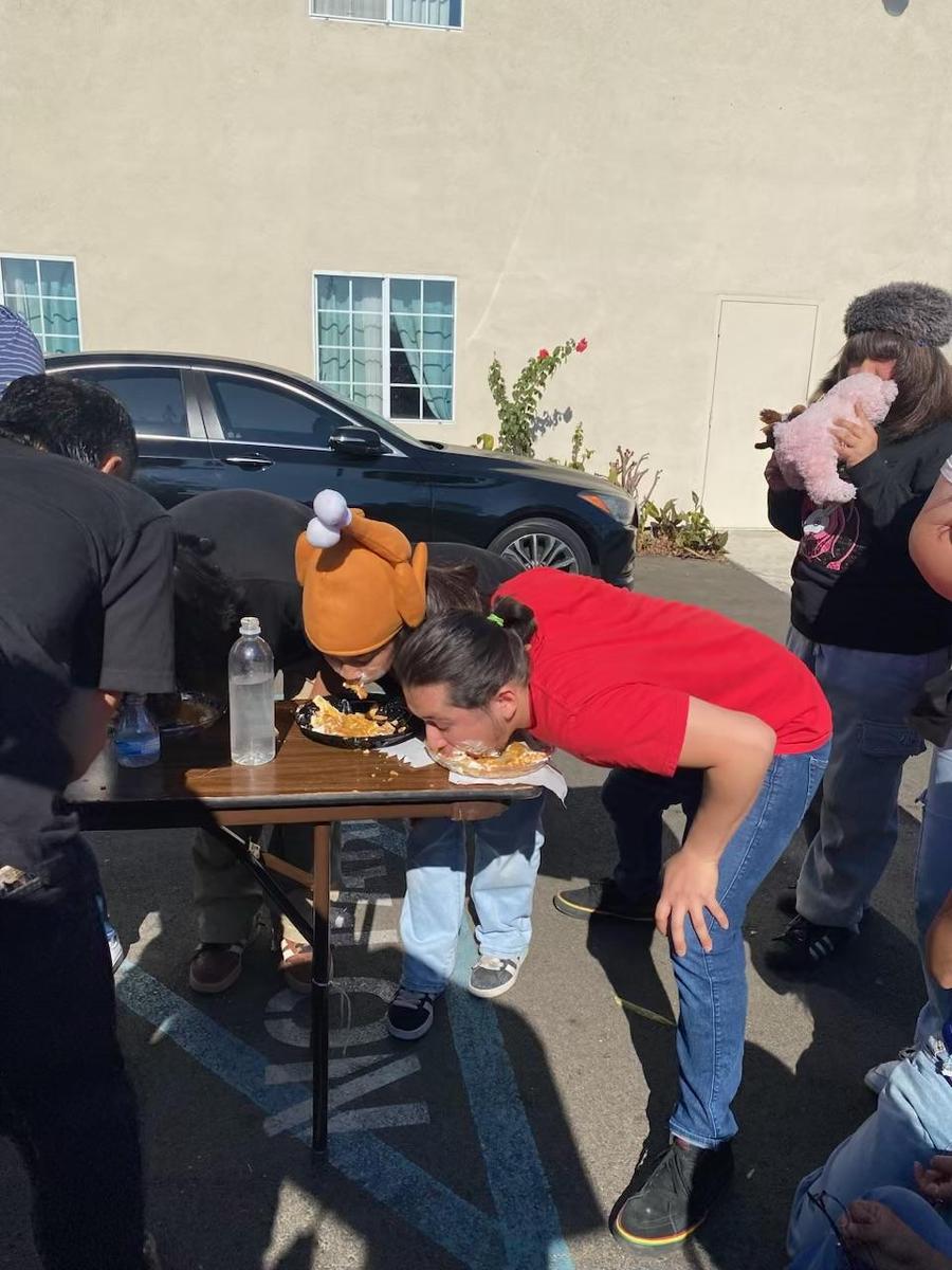 House Adviser Mr. Puga joins the Pie Eating Contest!
