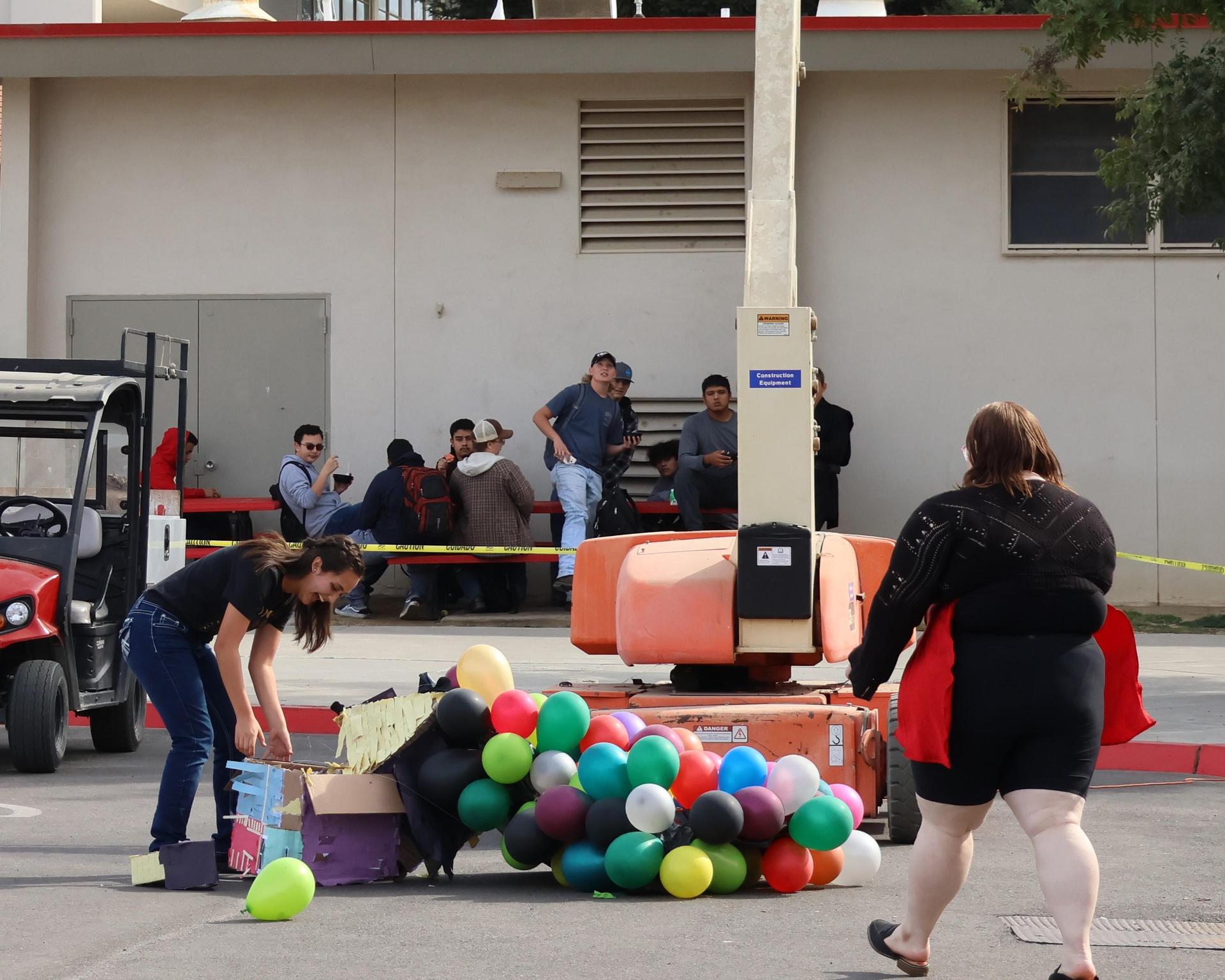 students and staff enjoying the pumpkin drop