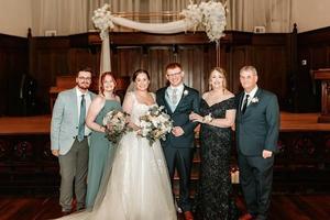 Dr. Smith and his family celebrating his daughter's wedding