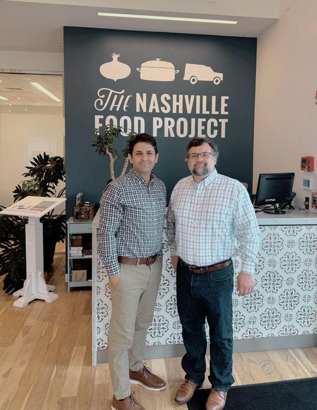 Nashville School of Excellence Founding Principal Mr. Kazim Kizilkaya visits The Nashville Food Project headquarters and poses with CEO C.J. Sentell following a meeting about community partnerships and expanding opportunities for Nashville students and families.