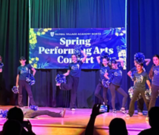 Cheerleaders on stage at Spring Performance