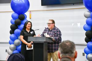 Music Teachers Ami Garvin and Jeff Blackstone share their excitement with the audience.