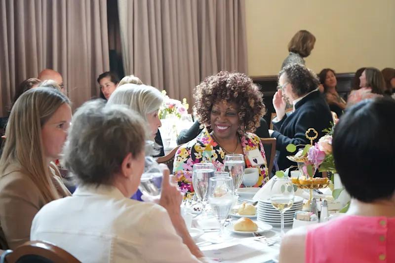 Guests gathered around a circular table