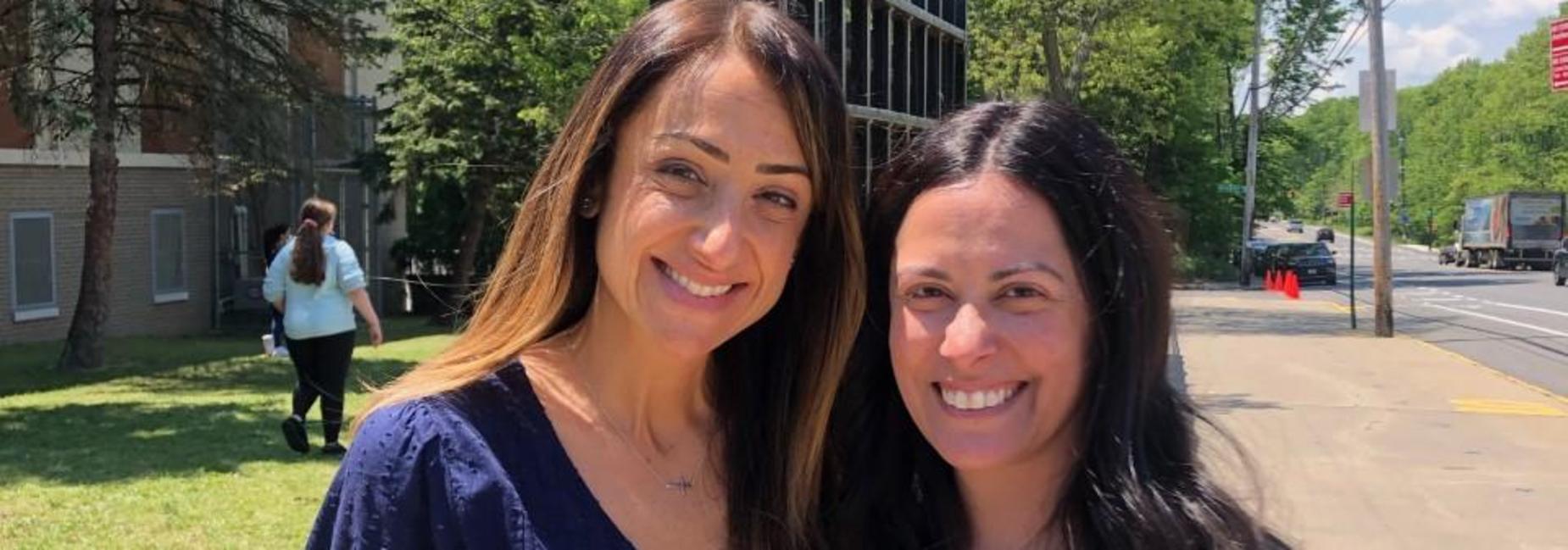 Mrs. Bavuso and Mrs. Boos outside of IS 7