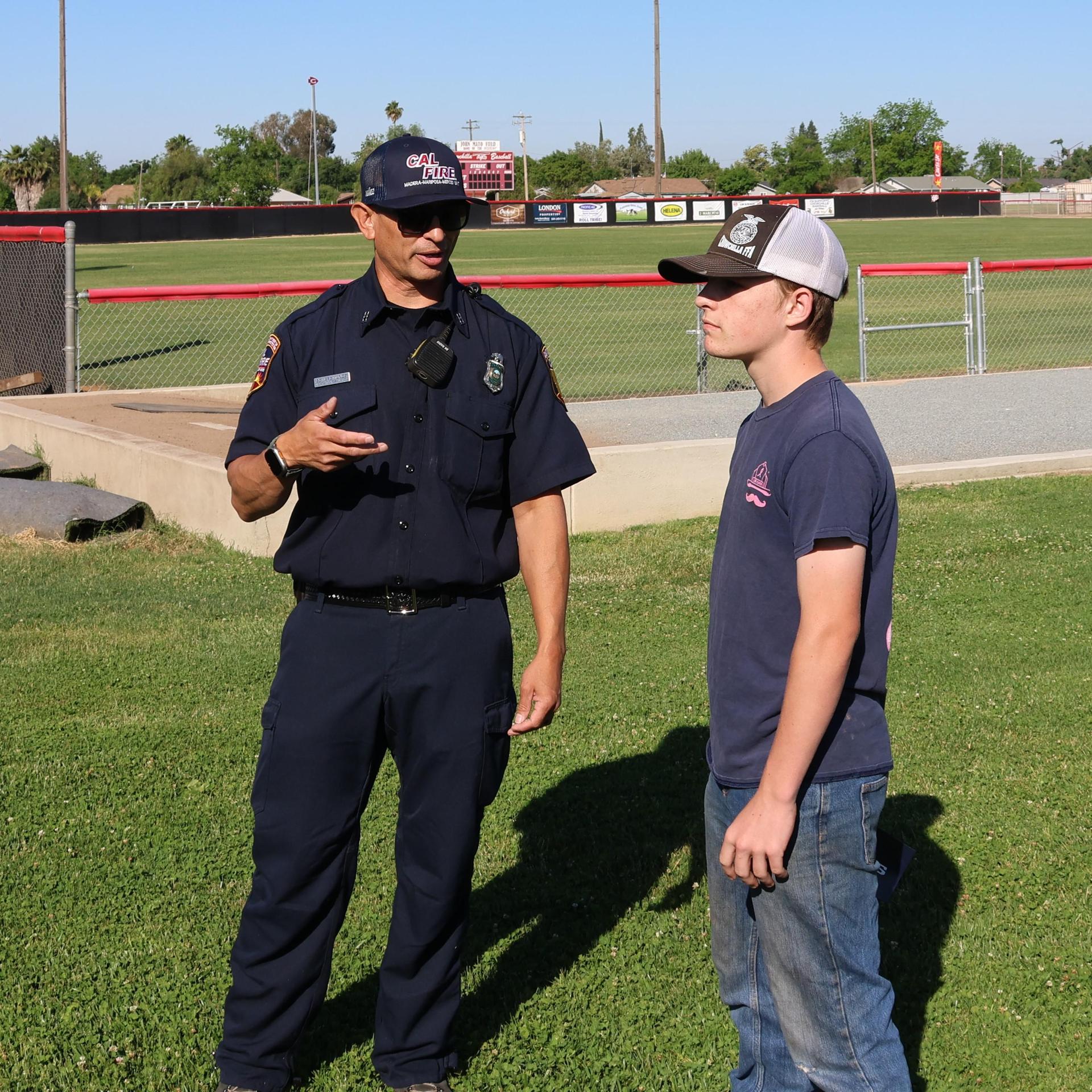 Firefighters speaking to students
