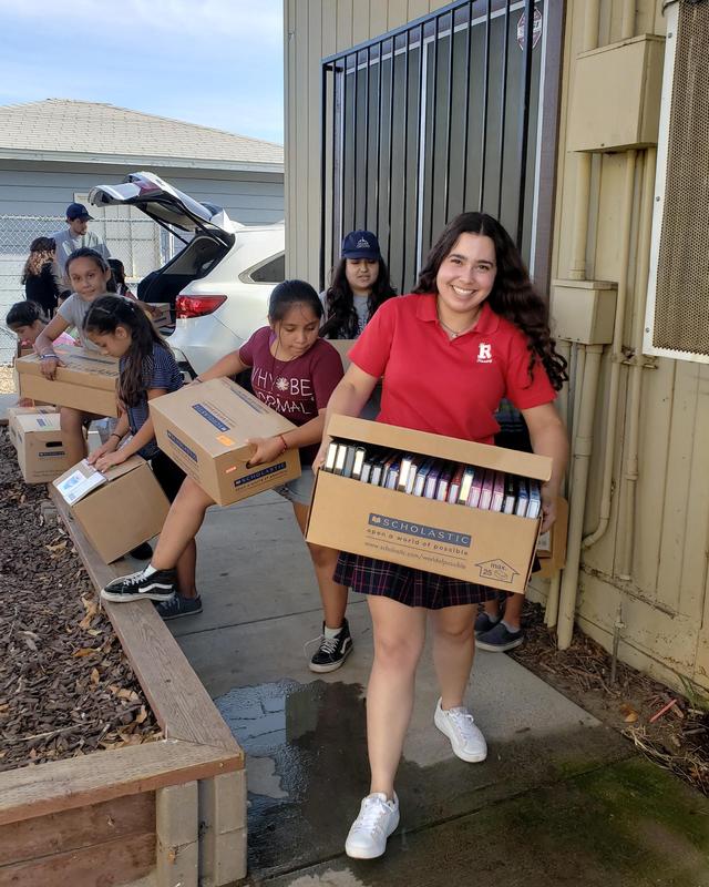 Isabella Tejeda '20 has collected over 500 books for children in need. Featured Photo