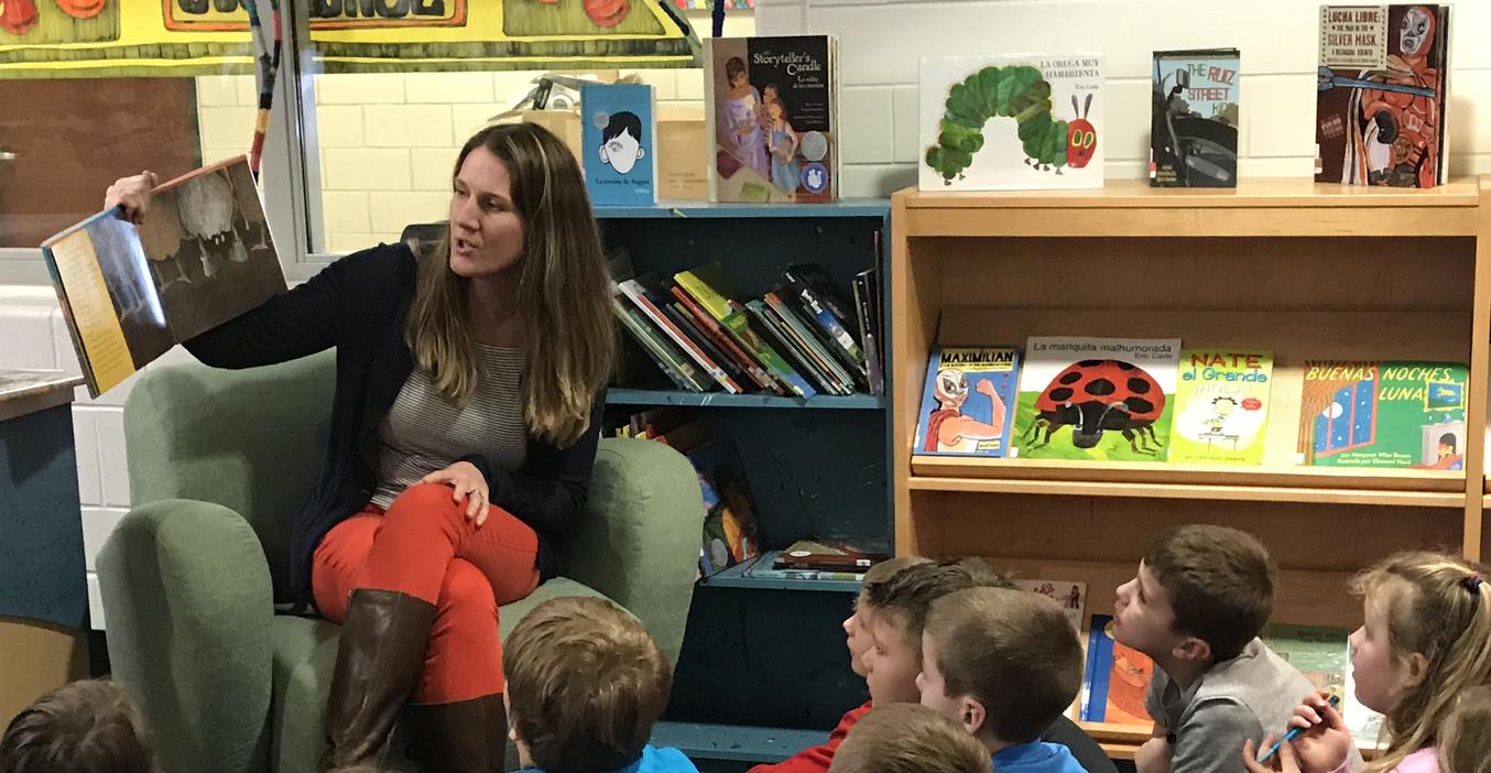 Lee Principal Angie Jefferson reads to students.