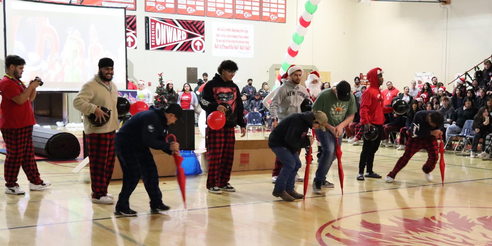 students playing the balloon pop game
