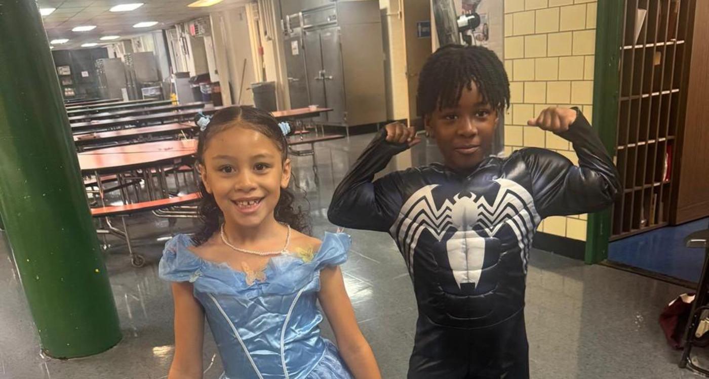 Students dressed as a Princess and as Marvel Character Venom