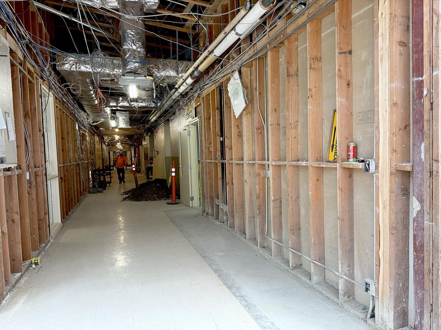 new concrete poured in trench along wall