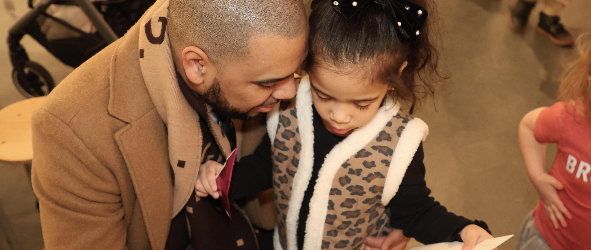 Family looking at art