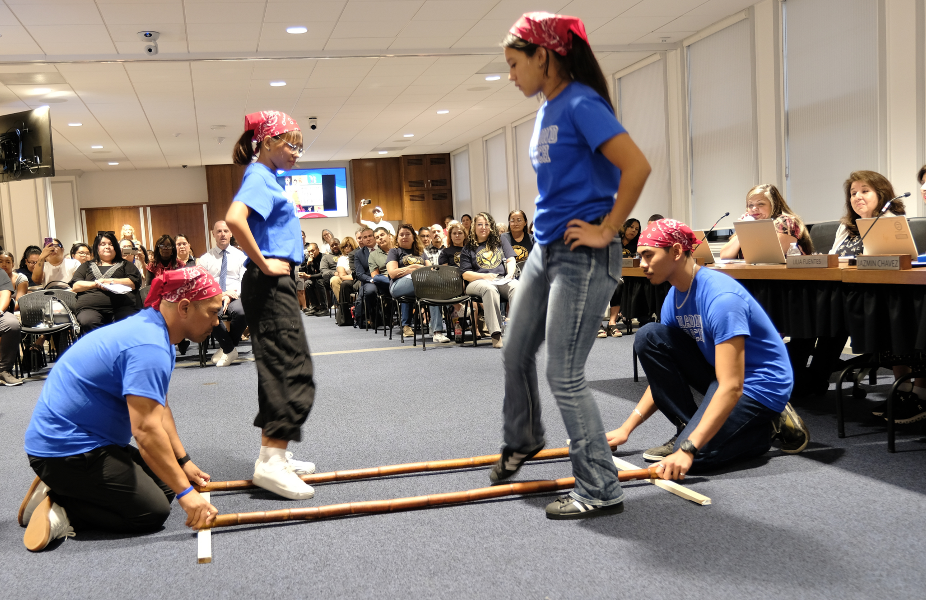 Board meeting on September 9, 2026 - pictures of DRHS students dancing a traditional Filipino dance