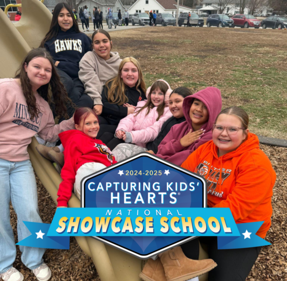 Hampton students on the slide at recess.