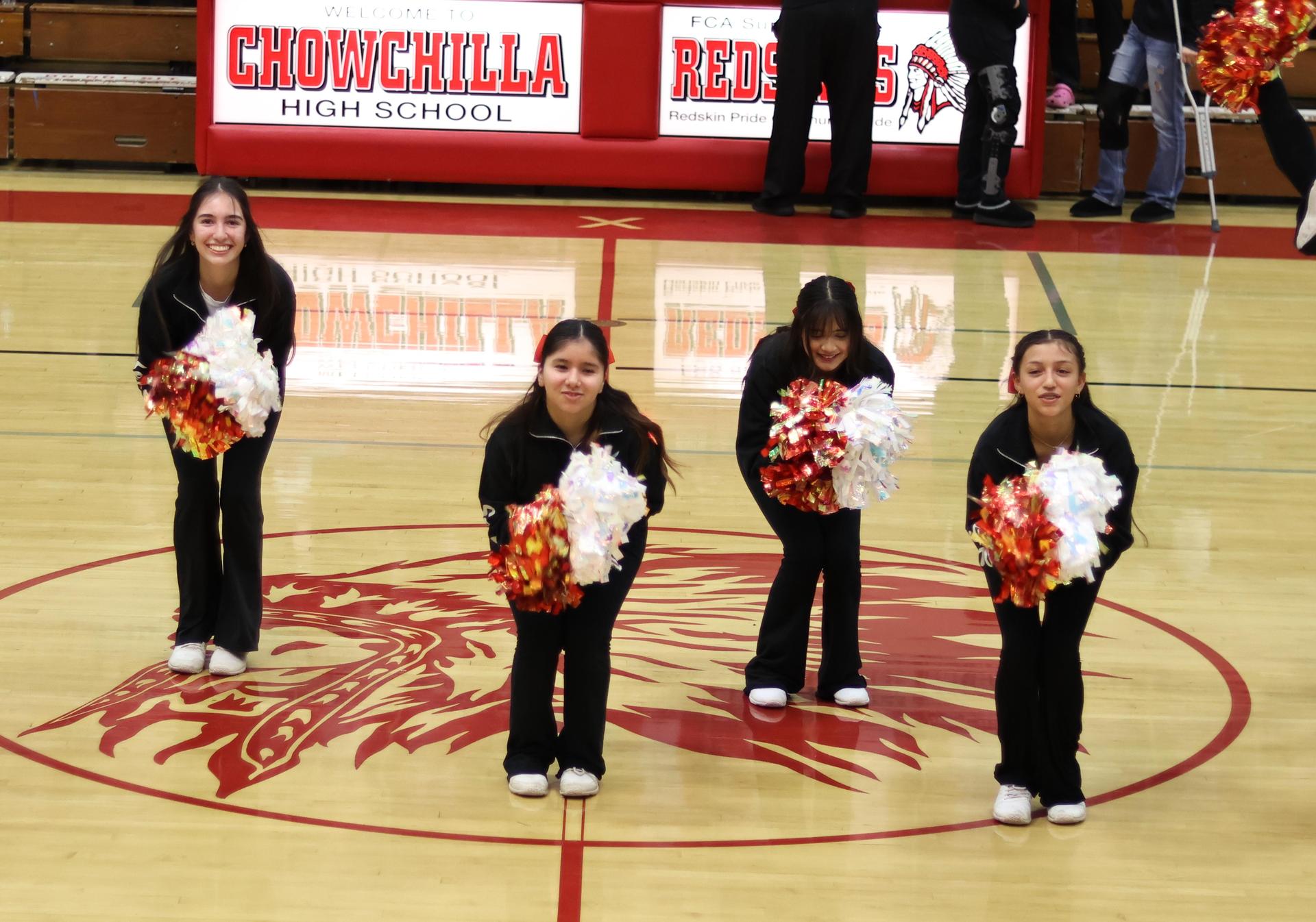 varsity cheerleaders in action