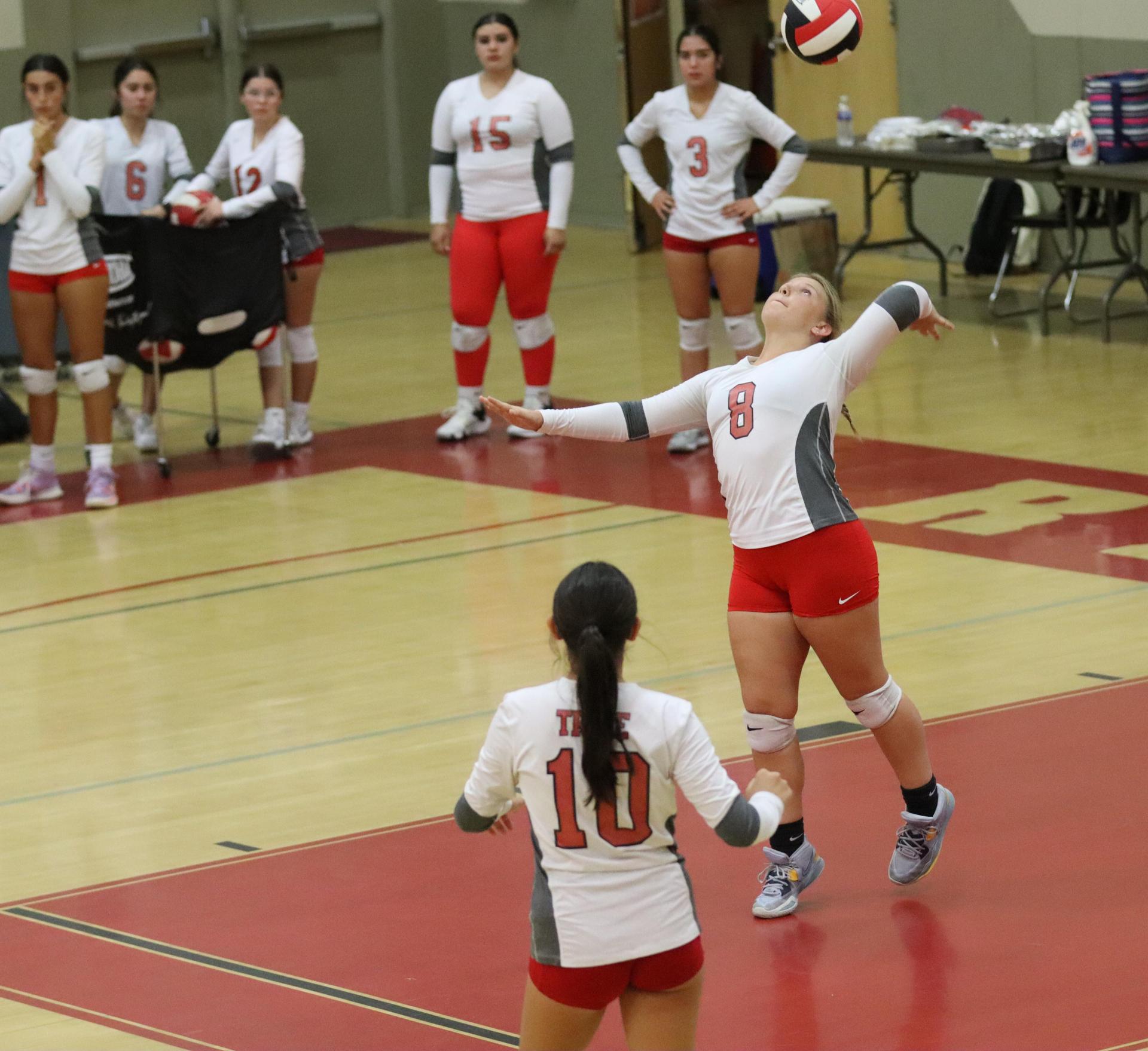 junior varsity girls playing volleyball against Liberty