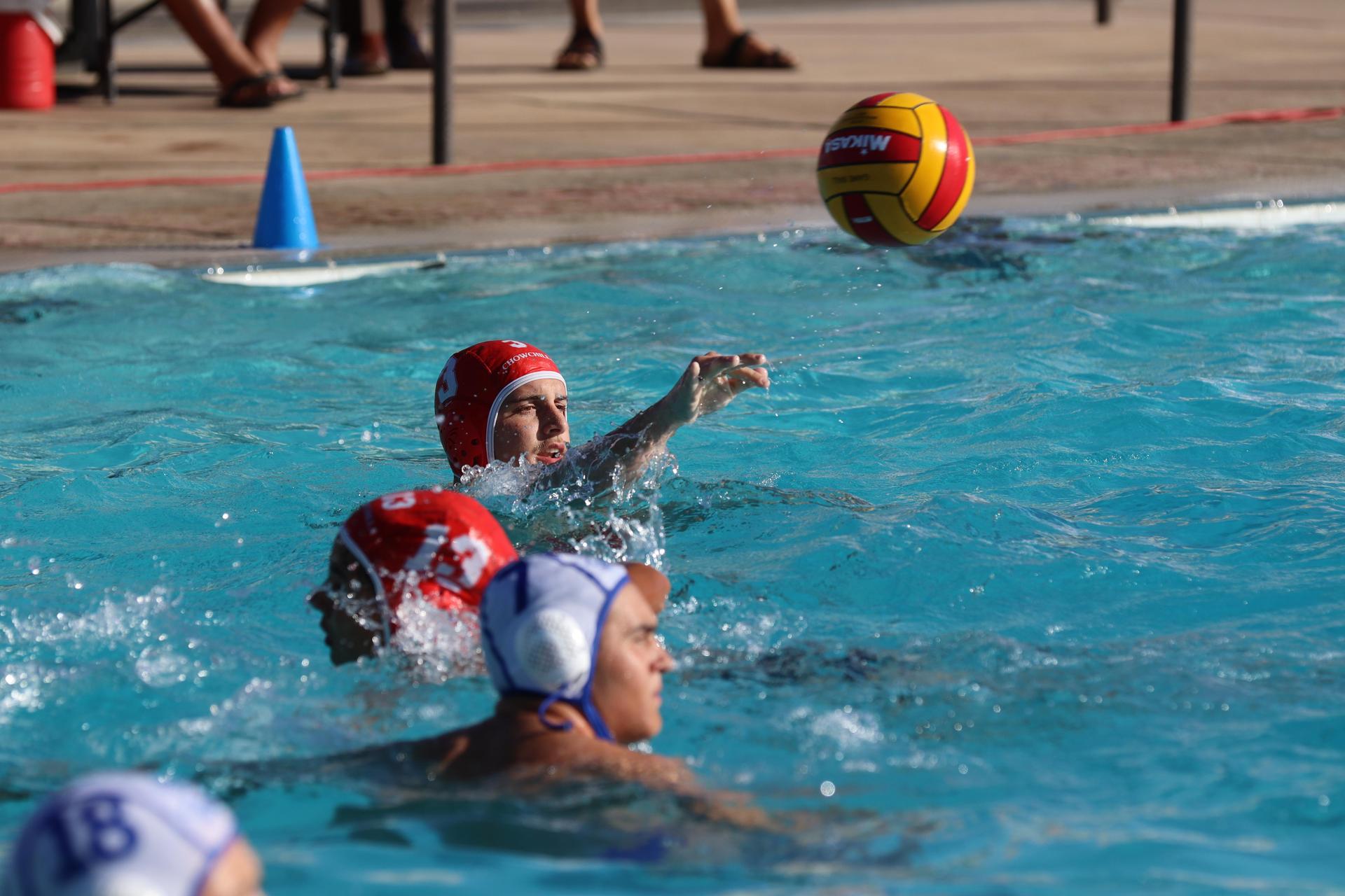boys playing water polo against Madera