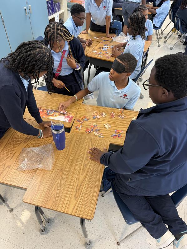 8th Grade Students Build Problem-Solving Skills Through Puzzle Challenge Featured Photo