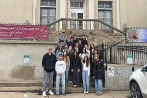 Students gather on the steps outside the Latin American Cultural Center in Oakland