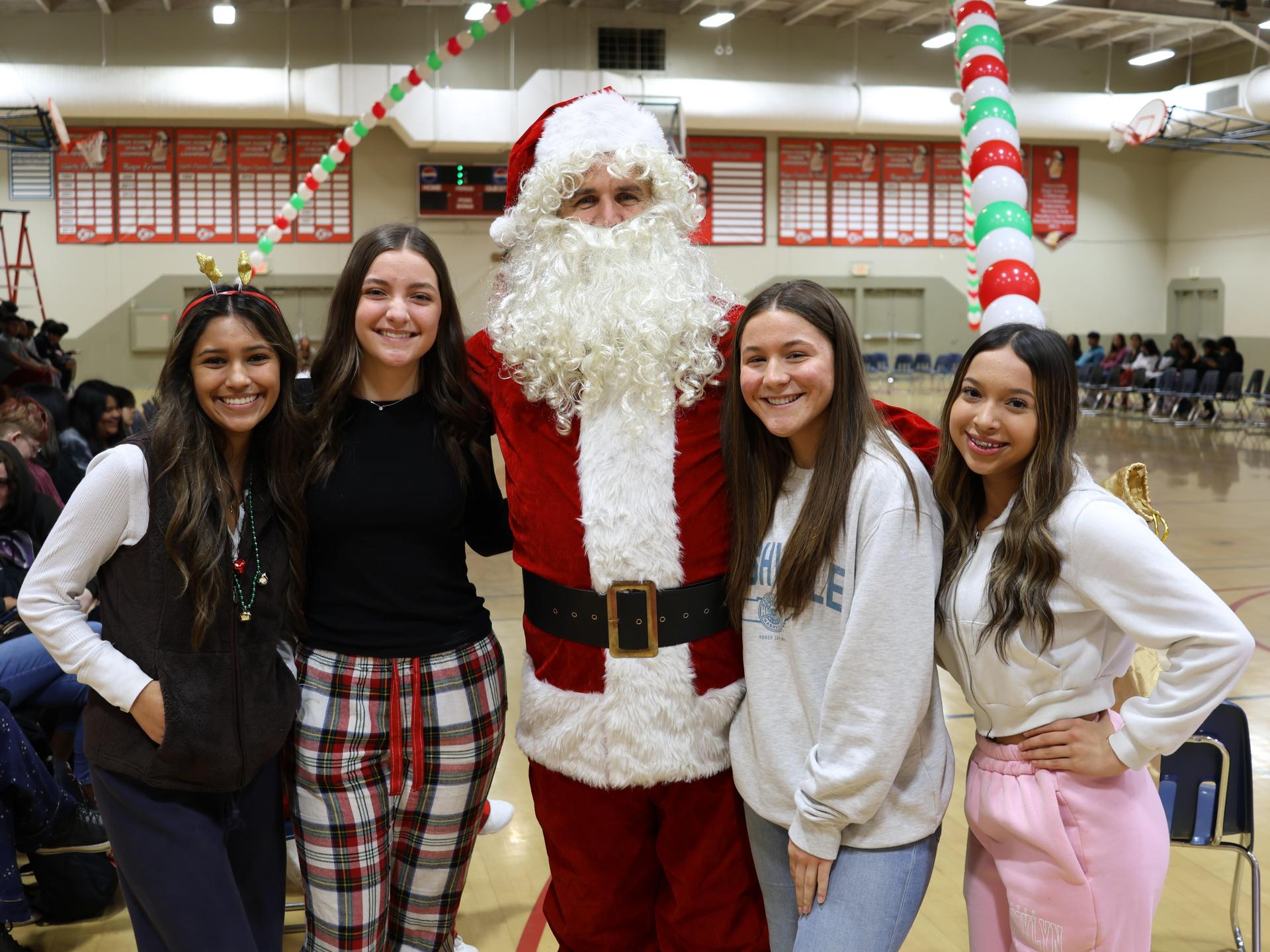 students and staff posing at the winter wishes rally